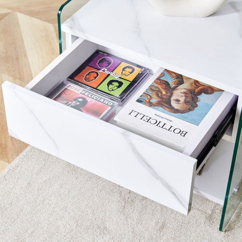 Bedside Table With Drawers. The Board Surface Is MDF Sticker, And Both Sides Are Transparent Tempered Glass. The Design Is Simple And Elegant, With Excellent Storage Functions