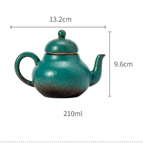 Ceramic handmade ball hole teapot kiln turned green