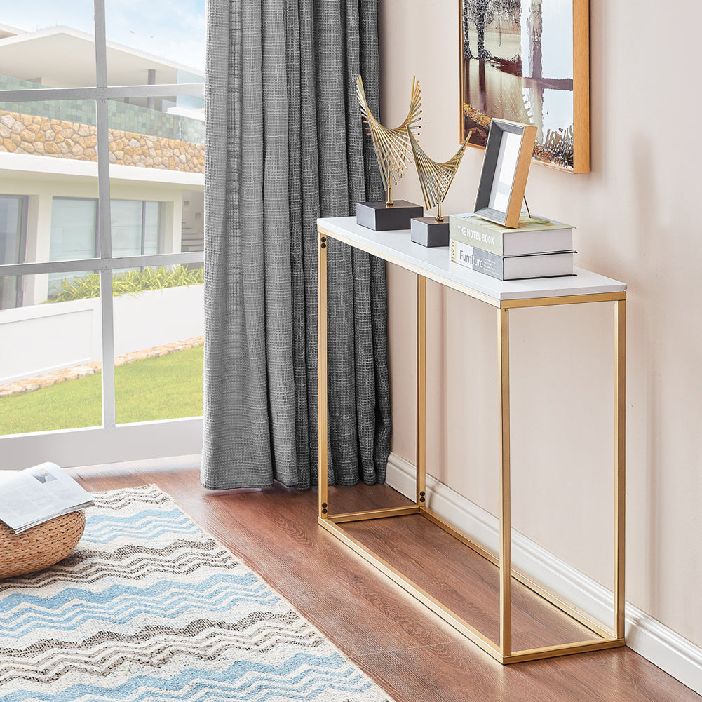 White Rectangular Marble With Gold Legs In The Hallway