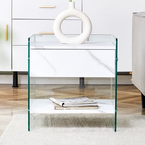Bedside Table With Drawers. The Board Surface Is MDF Sticker, And Both Sides Are Transparent Tempered Glass. The Design Is Simple And Elegant, With Excellent Storage Functions
