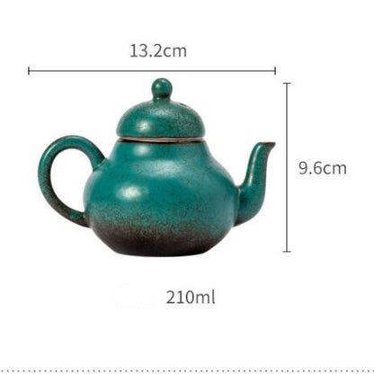 Ceramic handmade ball hole teapot kiln turned green