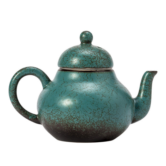 Ceramic handmade ball hole teapot kiln turned green